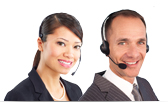 Two customer service agents with headsets are smiling